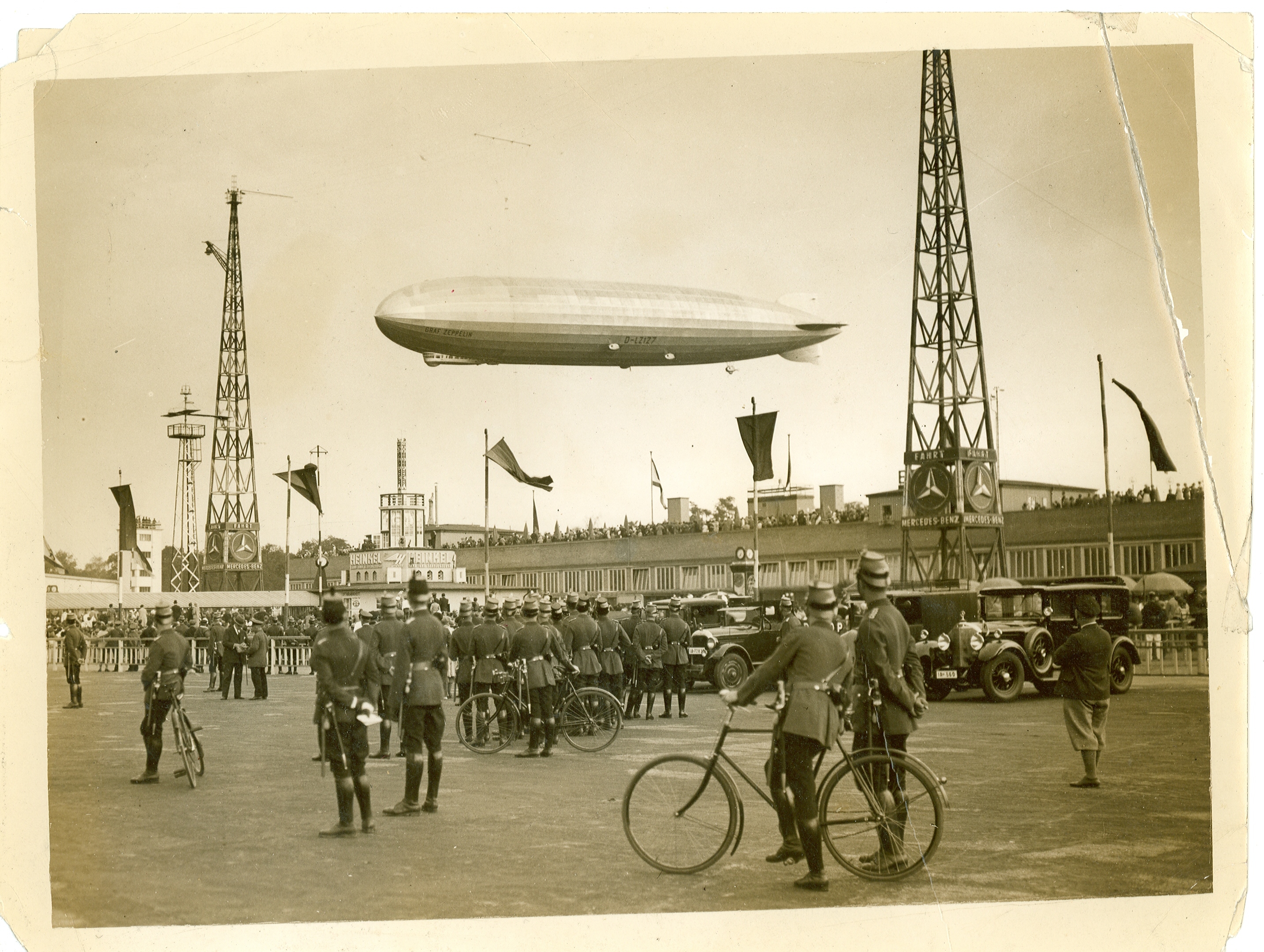 Graf Zeppelin hovering over a crowd of onlookers in Berlin, Germany. (U.S. Coast Guard) Graf Zeppelin hovering over a crowd of onlookers in Berlin, Germany. (U.S. Coast Guard)